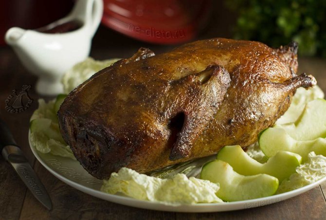 Duck with apples in the oven